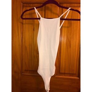 White body suit with cross back